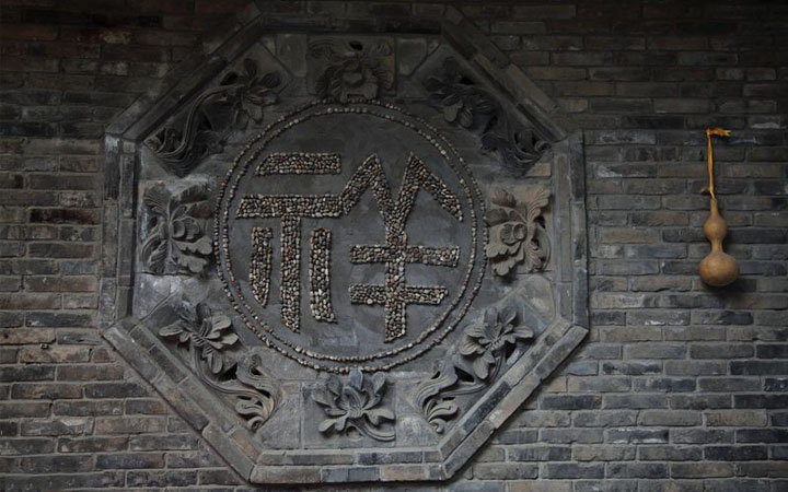 古建筑旅游規(guī)劃中的墻面雕刻